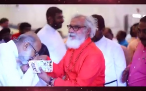 Admirer kissing the hand of K.P. Yohannan. From his 2017 birthday video.